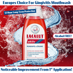Lacalut mouthwash bottle with water splashes on a red background